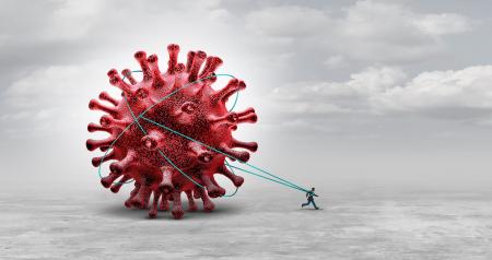 Man pulling large virus with rope