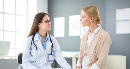 patient talking with a doctor